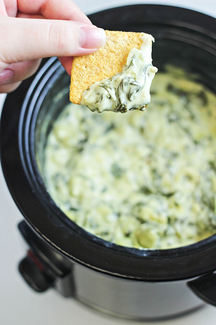 STYLECASTER | 12 Holiday Appetizers You Can Make in a Slow Cooker | Spinach Artichoke Dip