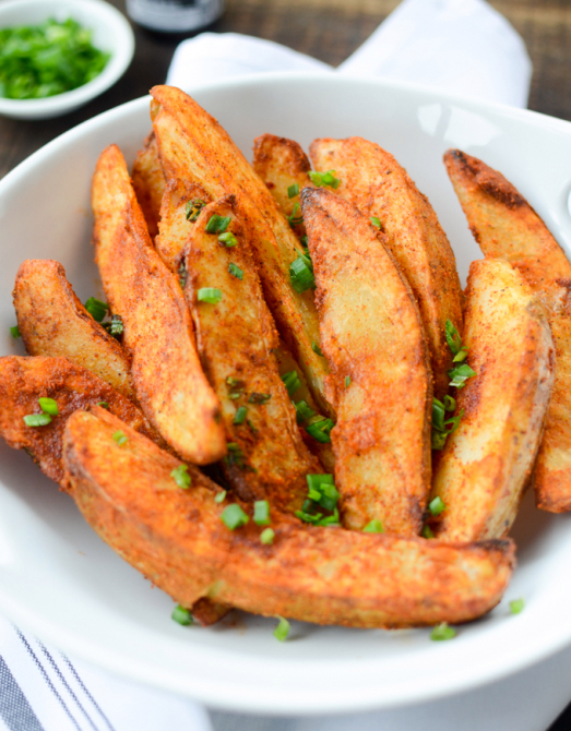 STYLECASTER | Holiday air fryer recipes | air fryer spiced potato wedges