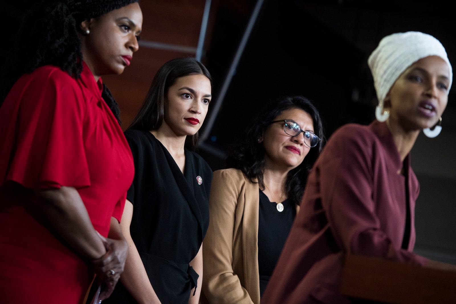 Image may contain Ilhan Omar Human Person Audience Crowd Clothing Apparel Sitting Glasses and Accessories