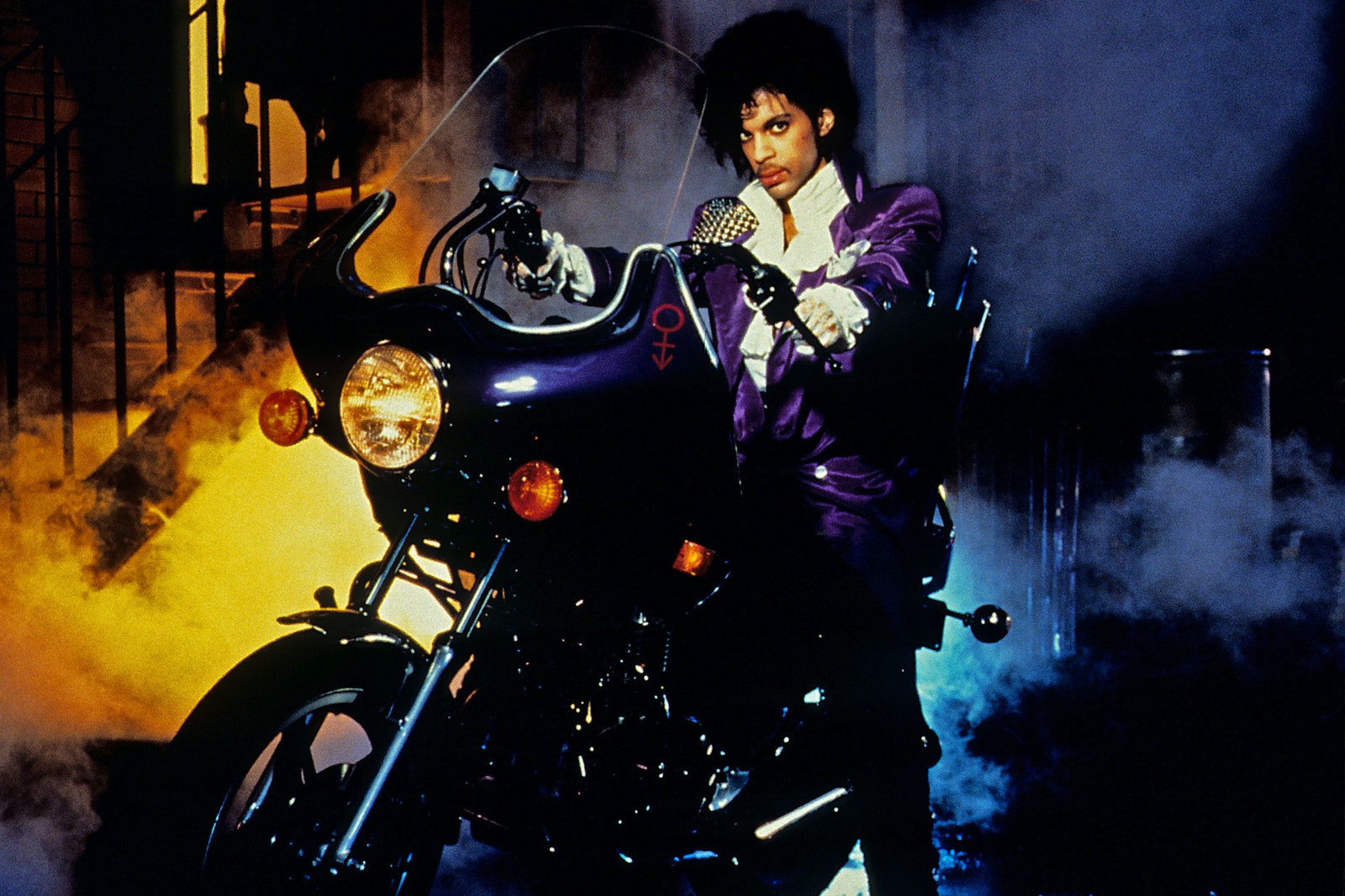 Image may contain Transportation Vehicle Motorcycle Prince Human and Person