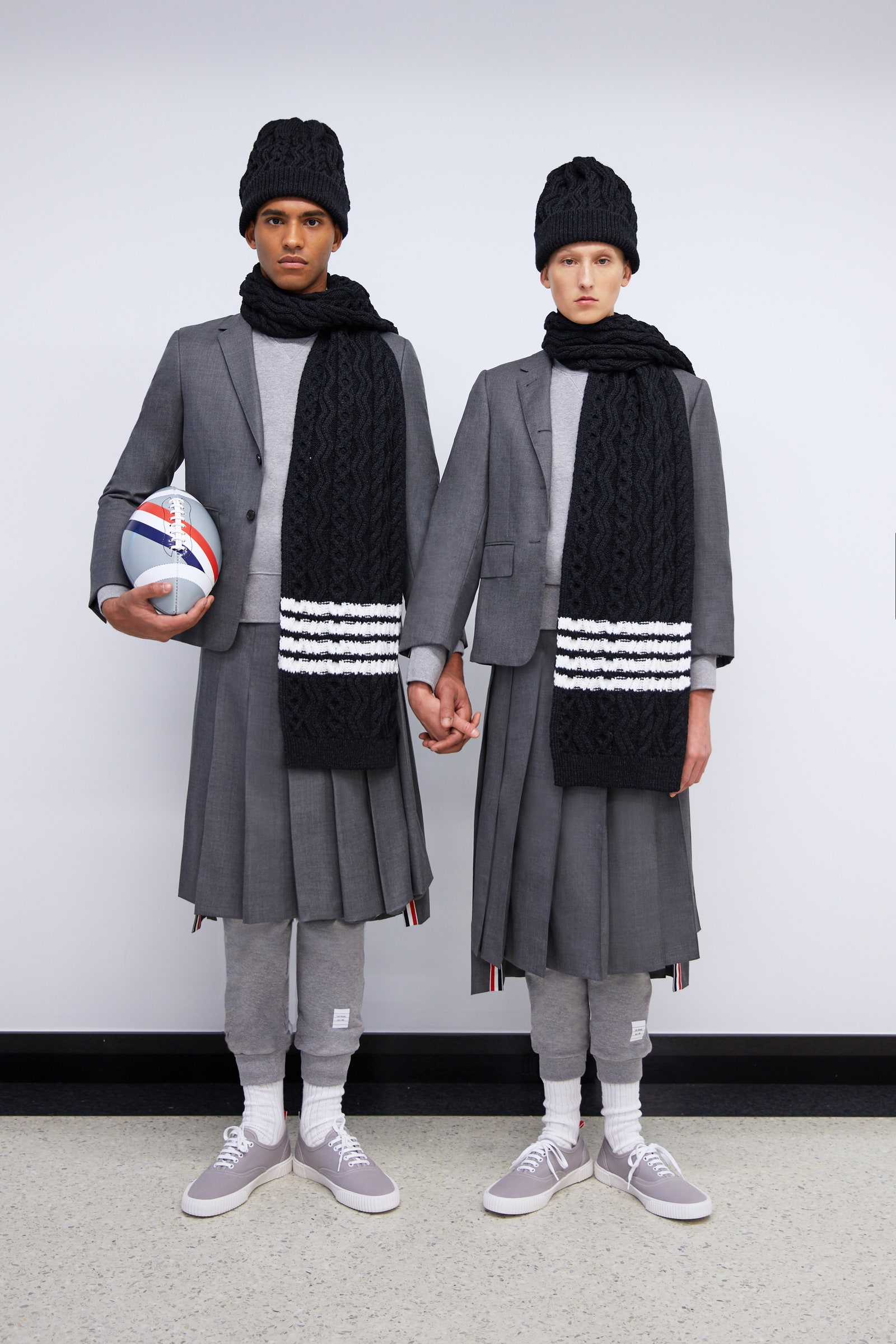 Two looks from Thom Browne's football capsule collection