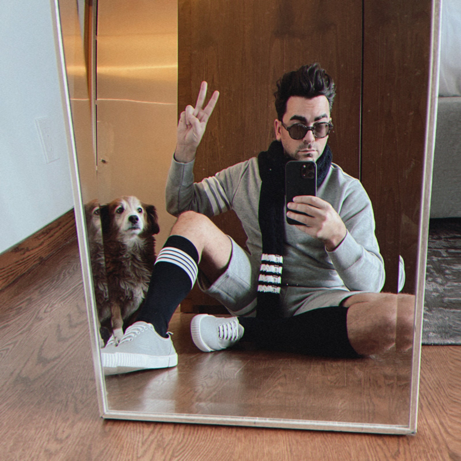 Dan Levy celebrates Thom Browne football remotely from Toronto